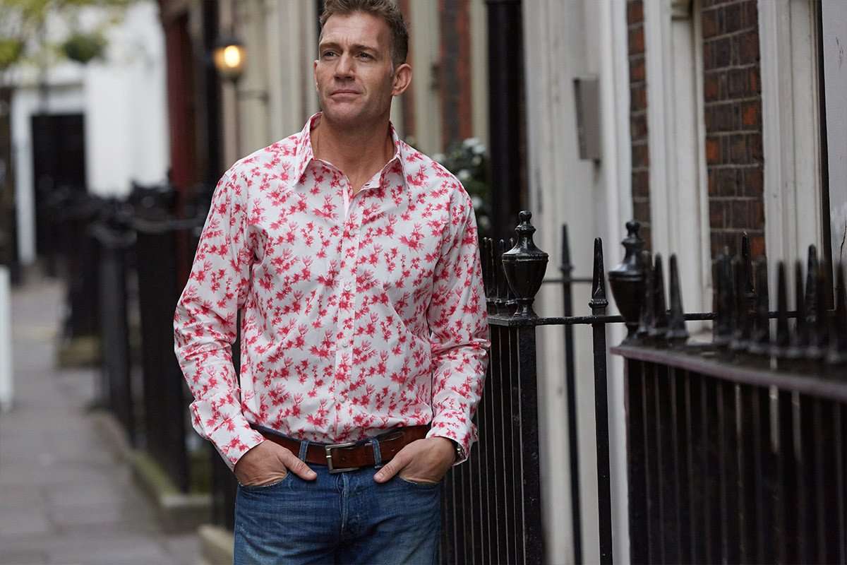 floral shirt with pink lilies outdoors